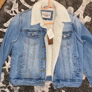 Women’s Jean jacket. Size small, brand new with tags.
